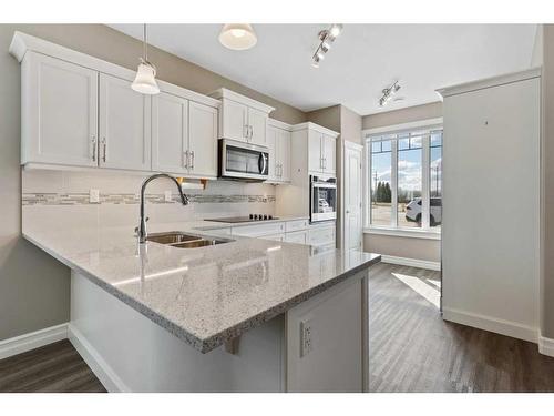 3911 49 Street, Camrose, AB - Indoor Photo Showing Kitchen With Double Sink