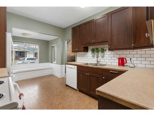 4938 49 Street, Sedgewick, AB - Indoor Photo Showing Kitchen With Double Sink