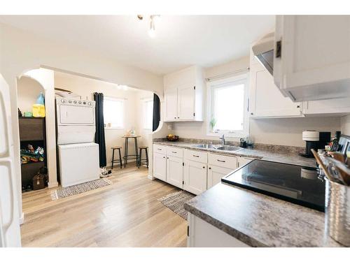 3705 50 Street, Red Deer, AB - Indoor Photo Showing Kitchen With Double Sink
