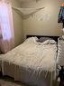 4911 42 Street, Innisfail, AB  - Indoor Photo Showing Bedroom 