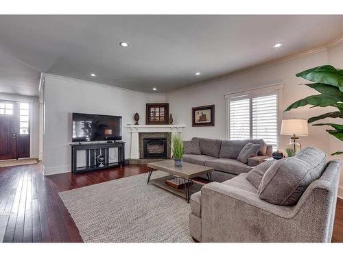 14 Alexander Crescent, Red Deer, AB - Indoor Photo Showing Living Room With Fireplace