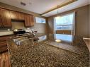 169 Carrington Drive, Red Deer, AB  - Indoor Photo Showing Kitchen With Double Sink 