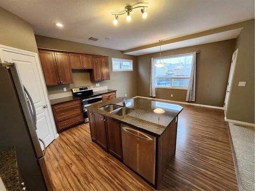 169 Carrington Drive, Red Deer, AB - Indoor Photo Showing Kitchen With Double Sink