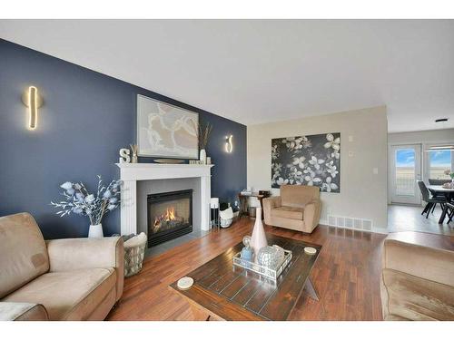 4642 58 Avenue, Rimbey, AB - Indoor Photo Showing Living Room With Fireplace