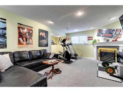 710 Hawkwood Boulevard Nw, Calgary, AB - Indoor Photo Showing Gym Room