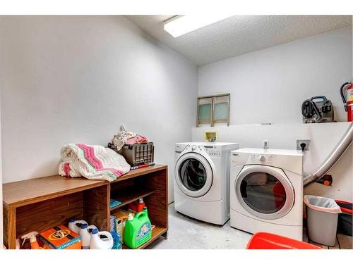 710 Hawkwood Boulevard Nw, Calgary, AB - Indoor Photo Showing Laundry Room