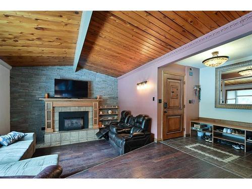 9 Cronquist Close, Red Deer, AB - Indoor Photo Showing Living Room With Fireplace