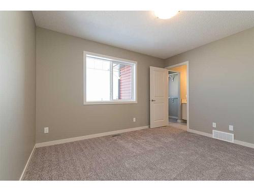 20 Emberside Grove, Cochrane, AB - Indoor Photo Showing Other Room
