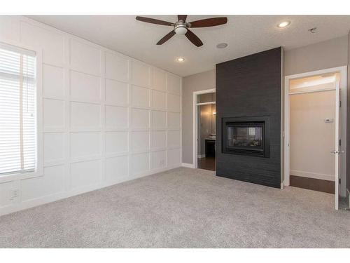24 Violet Place, Red Deer, AB - Indoor With Fireplace