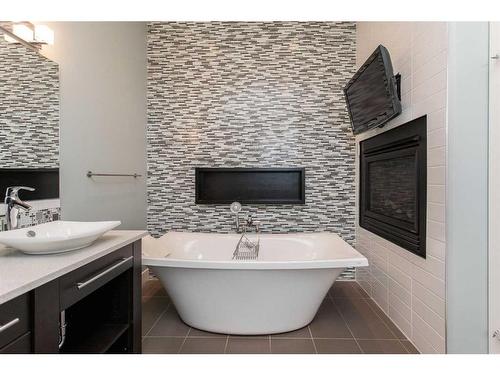 24 Violet Place, Red Deer, AB - Indoor Photo Showing Bathroom With Fireplace