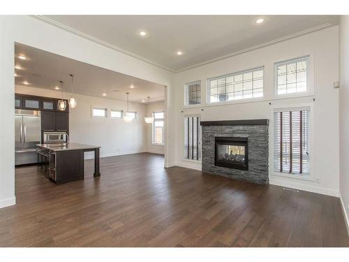 24 Violet Place, Red Deer, AB - Indoor Photo Showing Living Room With Fireplace