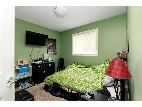 22 Richfield Crescent, Sylvan Lake, AB - Indoor Photo Showing Bedroom