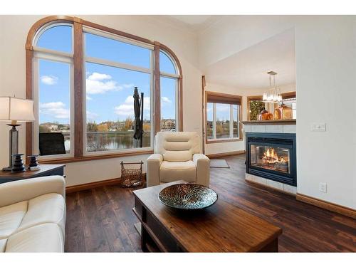 15 Archer Drive, Red Deer, AB - Indoor Photo Showing Living Room With Fireplace