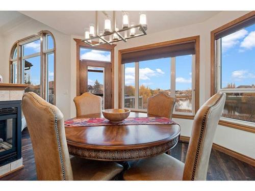 15 Archer Drive, Red Deer, AB - Indoor Photo Showing Dining Room With Fireplace