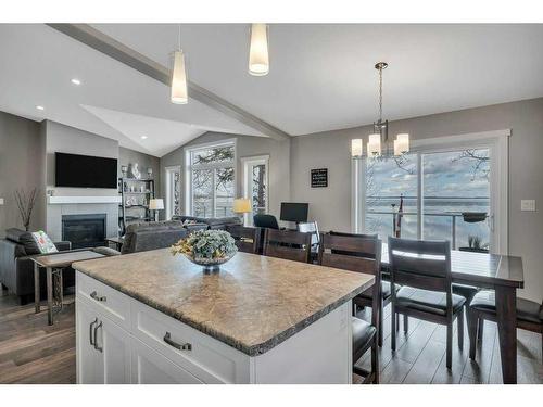 251 Lakeshore Dr, Grandview, AB - Indoor Photo Showing Dining Room With Fireplace