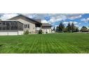 4 Birch Meadows, Gull Lake, AB  - Indoor Photo Showing Living Room With Fireplace 