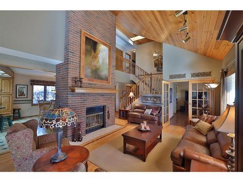 5215 67 Street, Ponoka, AB - Indoor Photo Showing Living Room With Fireplace