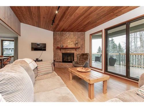 35 Lakeview Drive, Rural Ponoka County, AB - Indoor Photo Showing Living Room With Fireplace