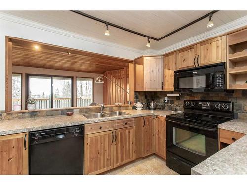 35 Lakeview Drive, Rural Ponoka County, AB - Indoor Photo Showing Kitchen With Double Sink