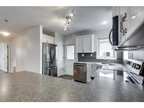 5829 Park Street, Blackfalds, AB - Indoor Photo Showing Kitchen With Stainless Steel Kitchen With Double Sink