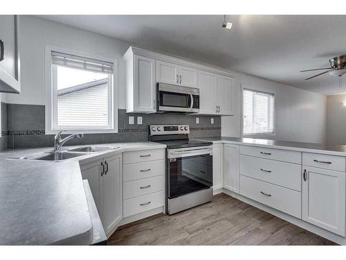 5829 Park Street, Blackfalds, AB - Indoor Photo Showing Kitchen With Stainless Steel Kitchen With Double Sink