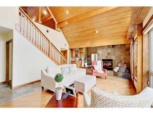 138-36240 Range Road 250, Rural Red Deer County, AB - Indoor Photo Showing Living Room With Fireplace