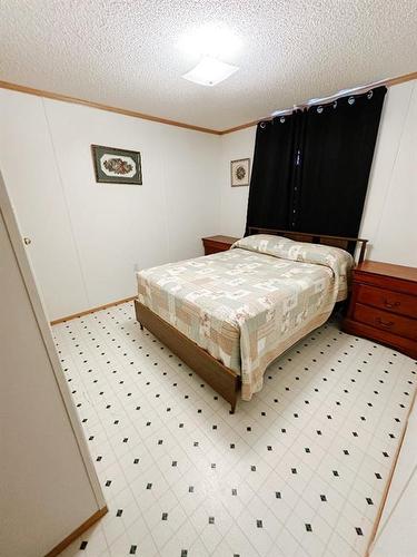 4512 59 Street, Rocky Mountain House, AB - Indoor Photo Showing Bedroom