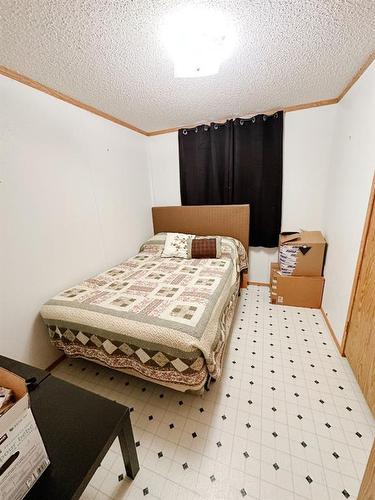 4512 59 Street, Rocky Mountain House, AB - Indoor Photo Showing Bedroom