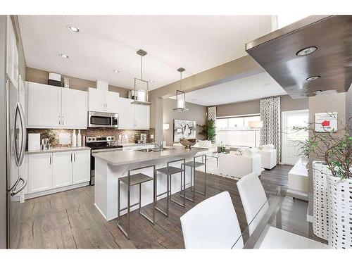 15 Legacy Close Se, Calgary, AB - Indoor Photo Showing Kitchen With Upgraded Kitchen
