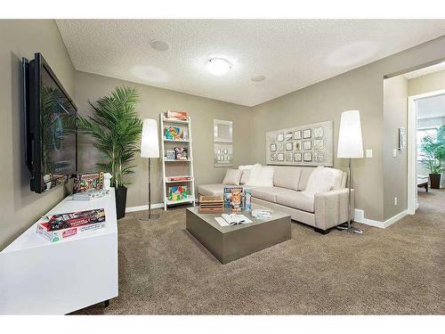 15 Legacy Close Se, Calgary, AB - Indoor Photo Showing Living Room