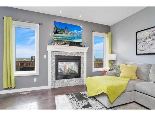 155 Morris Court, Blackfalds, AB - Indoor Photo Showing Living Room With Fireplace