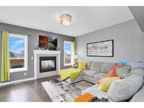 155 Morris Court, Blackfalds, AB - Indoor Photo Showing Living Room With Fireplace