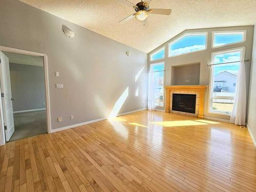 609 11 Avenue Sw, Slave Lake, AB - Indoor Photo Showing Living Room With Fireplace