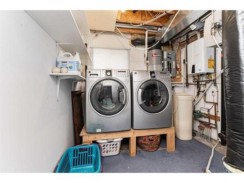 66 Mckinlay Crescent, Lacombe, AB - Indoor Photo Showing Laundry Room