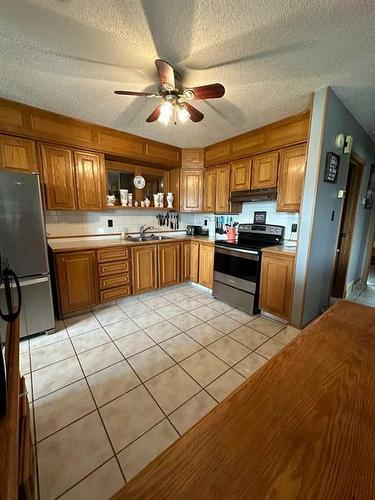 93 Nichols Crescent, Red Deer, AB - Indoor Photo Showing Kitchen With Double Sink