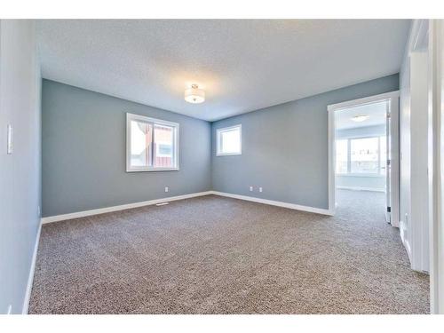 43 Versant View Sw, Calgary, AB - Indoor Photo Showing Other Room