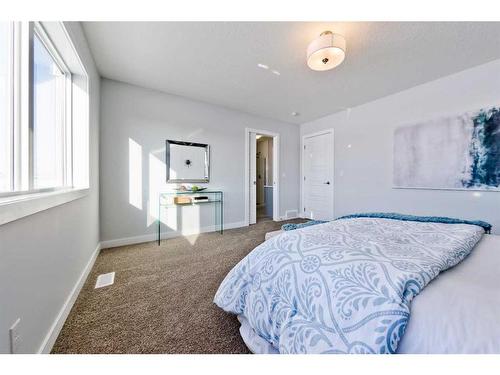 43 Versant View Sw, Calgary, AB - Indoor Photo Showing Bedroom