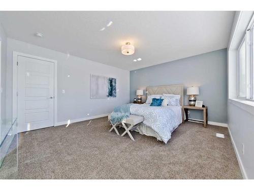 43 Versant View Sw, Calgary, AB - Indoor Photo Showing Bedroom
