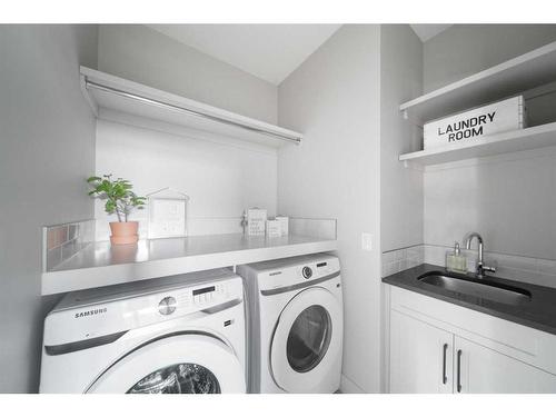 102 Royal Elm Green Nw, Calgary, AB - Indoor Photo Showing Laundry Room