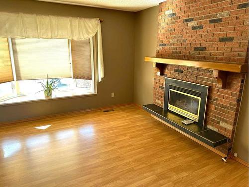 5624 48 Avenue, Lacombe, AB - Indoor With Fireplace