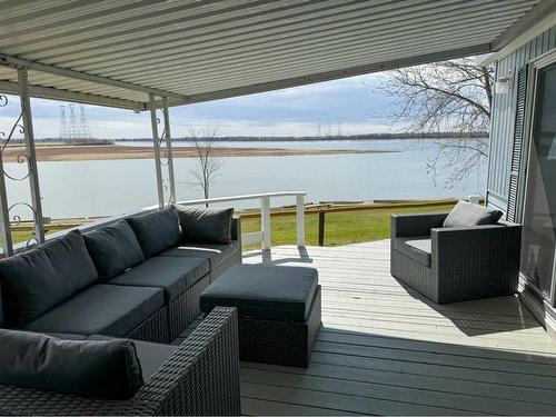 1017-35468 Range Road 30, Rural Red Deer County, AB - Outdoor With Body Of Water With Deck Patio Veranda With Exterior
