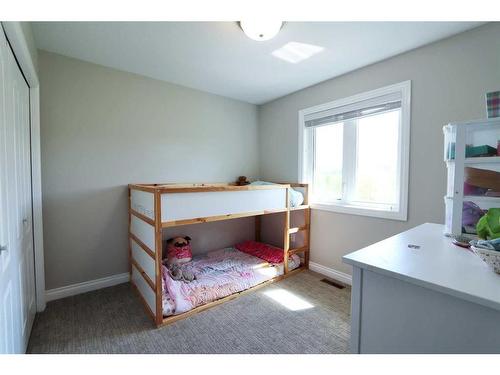 11 253050 Township Road, Rural Ponoka County, AB - Indoor Photo Showing Bedroom
