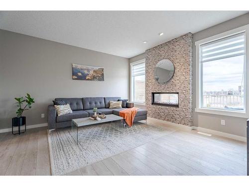 249 Walden Square Se, Calgary, AB - Indoor Photo Showing Living Room With Fireplace