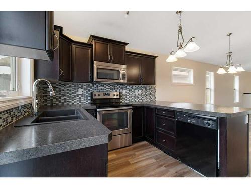24 Trimble Close, Red Deer, AB - Indoor Photo Showing Kitchen With Double Sink With Upgraded Kitchen