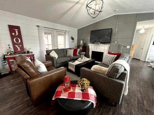197 433042 Range Road 221, Rural Ponoka County, AB - Indoor Photo Showing Living Room With Fireplace