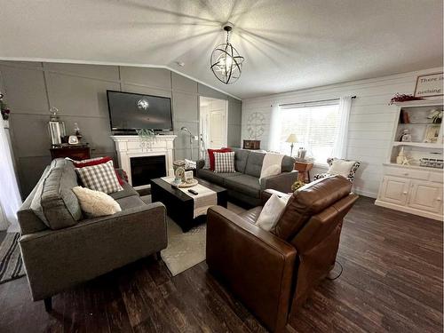 197 433042 Range Road 221, Rural Ponoka County, AB - Indoor Photo Showing Living Room With Fireplace