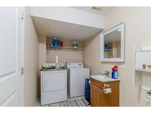 49 Amer Close, Red Deer, AB - Indoor Photo Showing Laundry Room