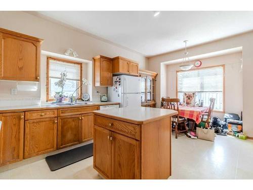 49 Amer Close, Red Deer, AB - Indoor Photo Showing Kitchen With Double Sink