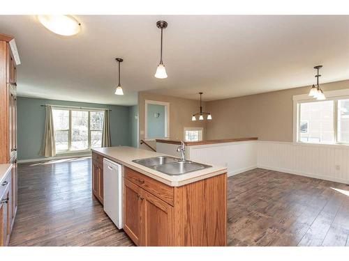 7004 Cobb Street, Lacombe, AB - Indoor Photo Showing Kitchen With Double Sink