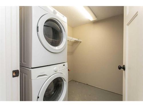 7004 Cobb Street, Lacombe, AB - Indoor Photo Showing Laundry Room
